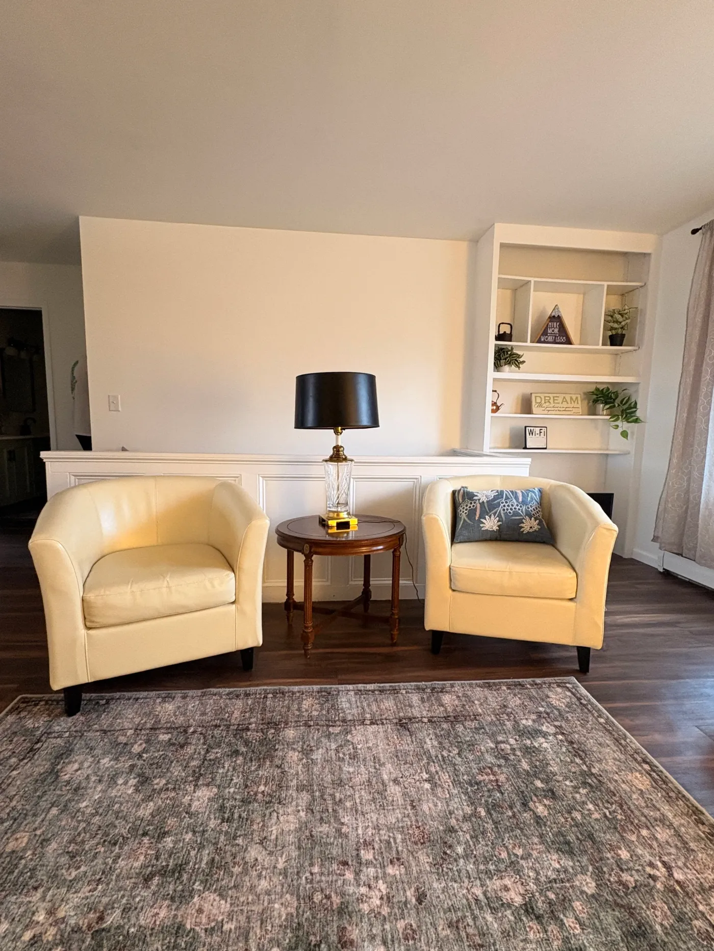 Living room with tan chairs